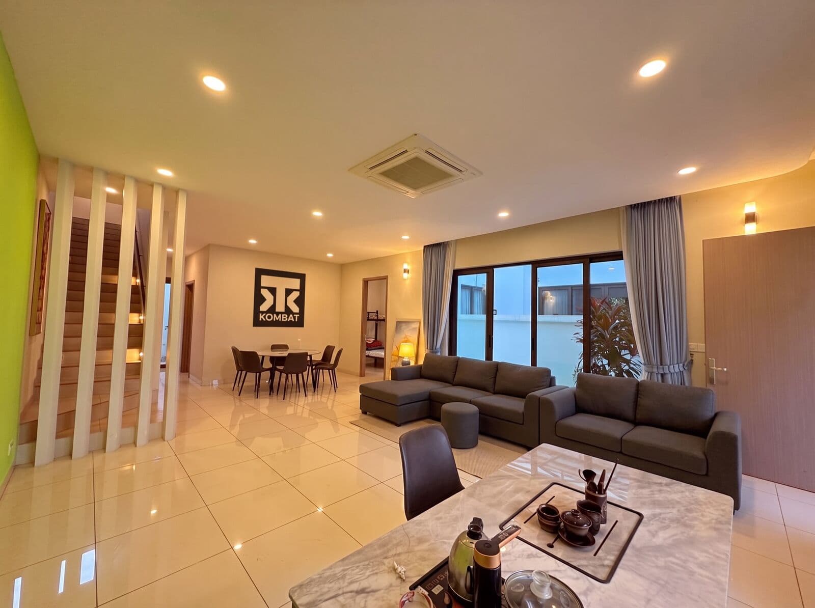 The shared living area at Kombat House at dusk